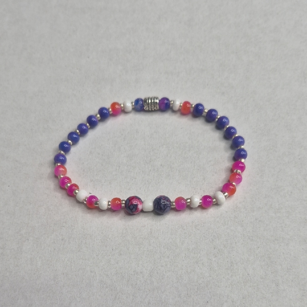 Vibrant Bracelet Featuring a Mix of Purple, Pink, and White Beads